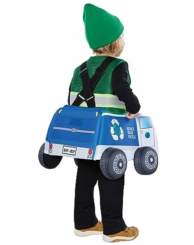 Child wearing a recycling truck costume with green hat and black pants.