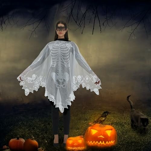 Person wearing a skeleton cape with jack-o'-lanterns and a black cat.